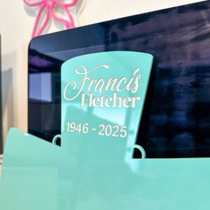 acrylic cross with a personal touch, a customised memorial plaque for a loved one.