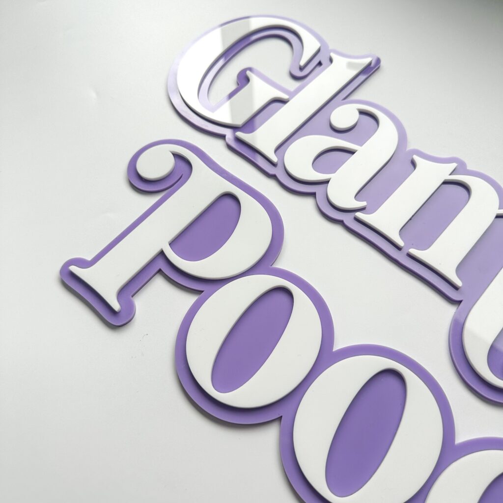 Custom double-layered acrylic business sign with a logo. Personalised, handcrafted, and bespoke. Acrylic.