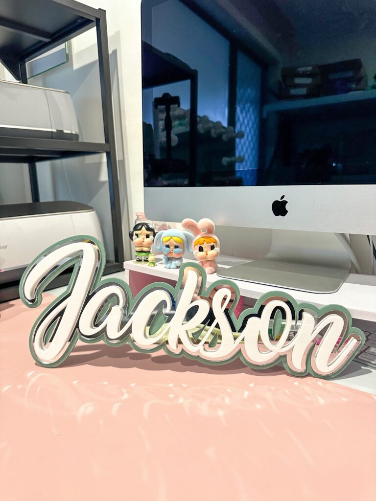 Personalised triple layer acrylic name sign crafted from premium 3 mm layered acrylic for a bold 3D statement.