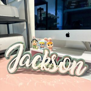 Personalised triple layer acrylic name sign crafted from premium 3 mm layered acrylic for a bold 3D statement.