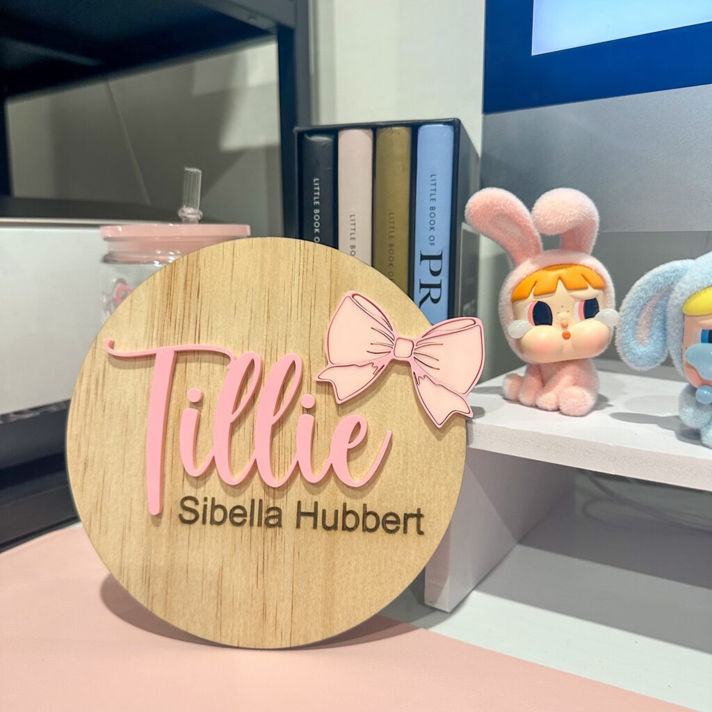 engraved plywood with acrylic detailing, personalised baby announcement plaque bow theme.