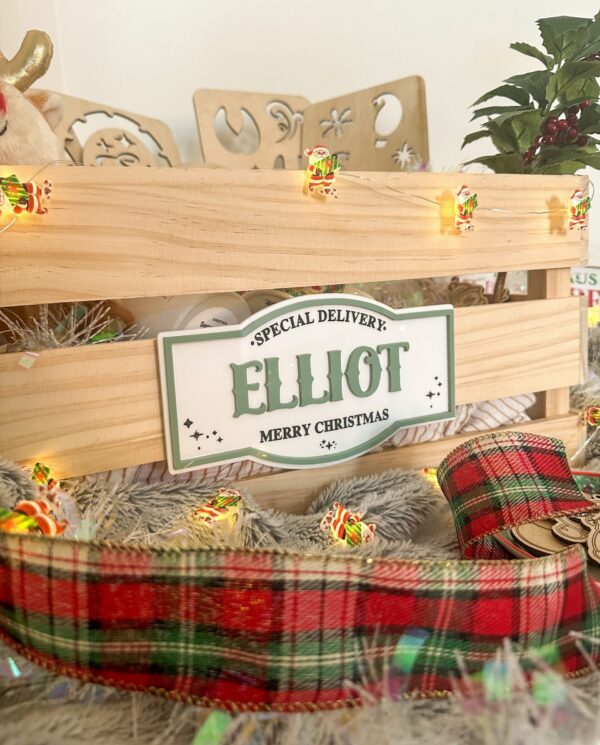 A 3D engraved Christmas plaque, made from layered acrylic, with a personalised Santa design.