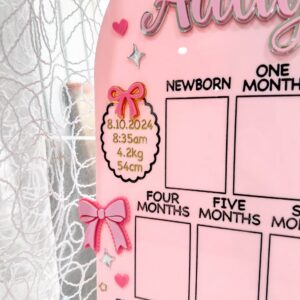 acrylic photo board with bow theme, personalised with baby's name and first year details. A keepsake for a special first.