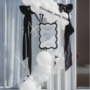 The product is a custom, handcrafted, multi-size wave acrylic event board sign with a border, made of layered acrylic.