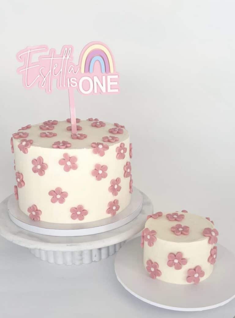 Personalised rainbow cake topper customised with name and age, handmade in acrylic.