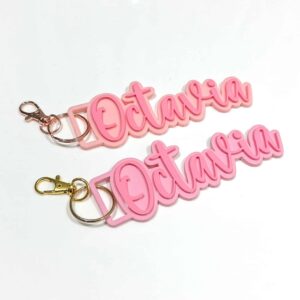 Custom double layer keychain and bag tag made from layered acrylic with a gold finish. Personalised, custom, handcrafted.