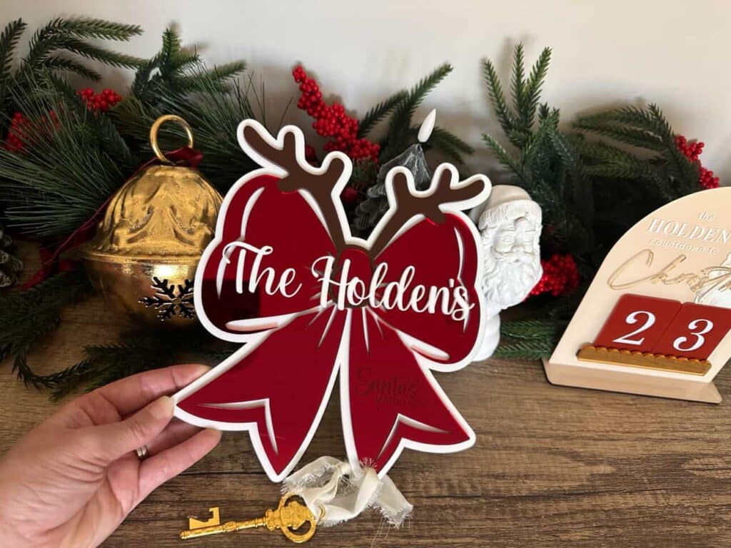 layered acrylic with mirrored finish personalised Christmas bow door hanger – Santa’s Key.