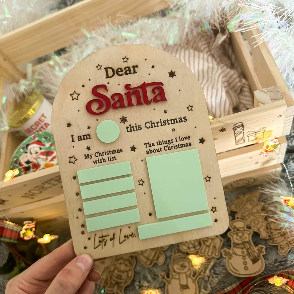 Wooden Santa wish list board for kids with sticky notes and Christmas decorations​