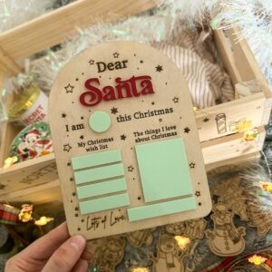 Wooden Santa wish list board for kids with sticky notes and Christmas decorations​
