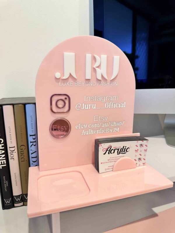 Product photo of a personalised acrylic sign on a plain background.