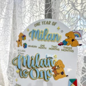 Personalised acrylic name plaque on a plain background for home or event use.