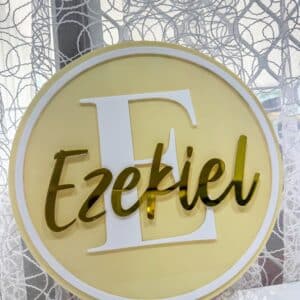 Personalised acrylic name plaque with custom lettering on a plain background.