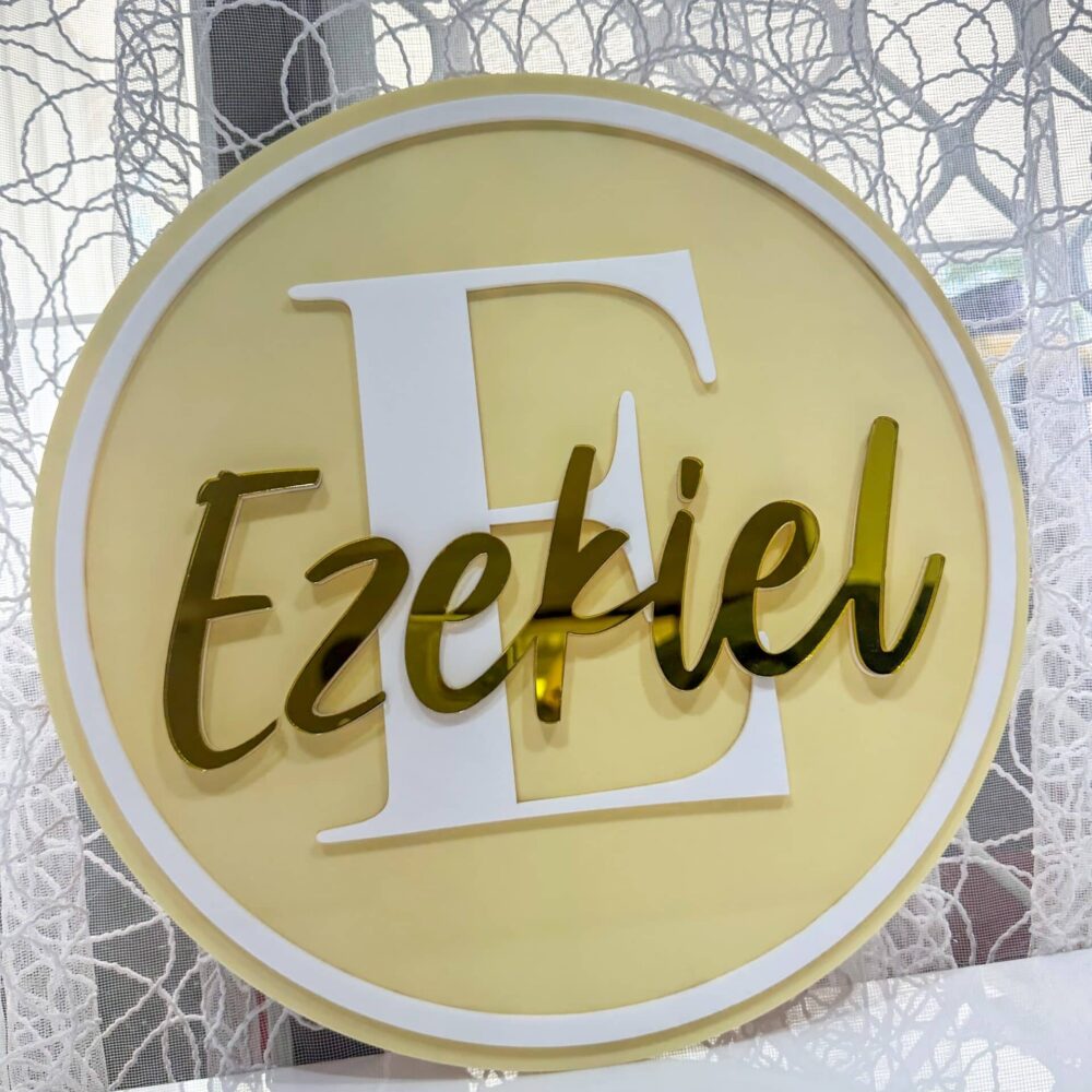 Personalised acrylic name plaque with custom lettering on a plain background.