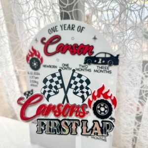 Personalised acrylic name wall sign with scripted lettering on a plain background.