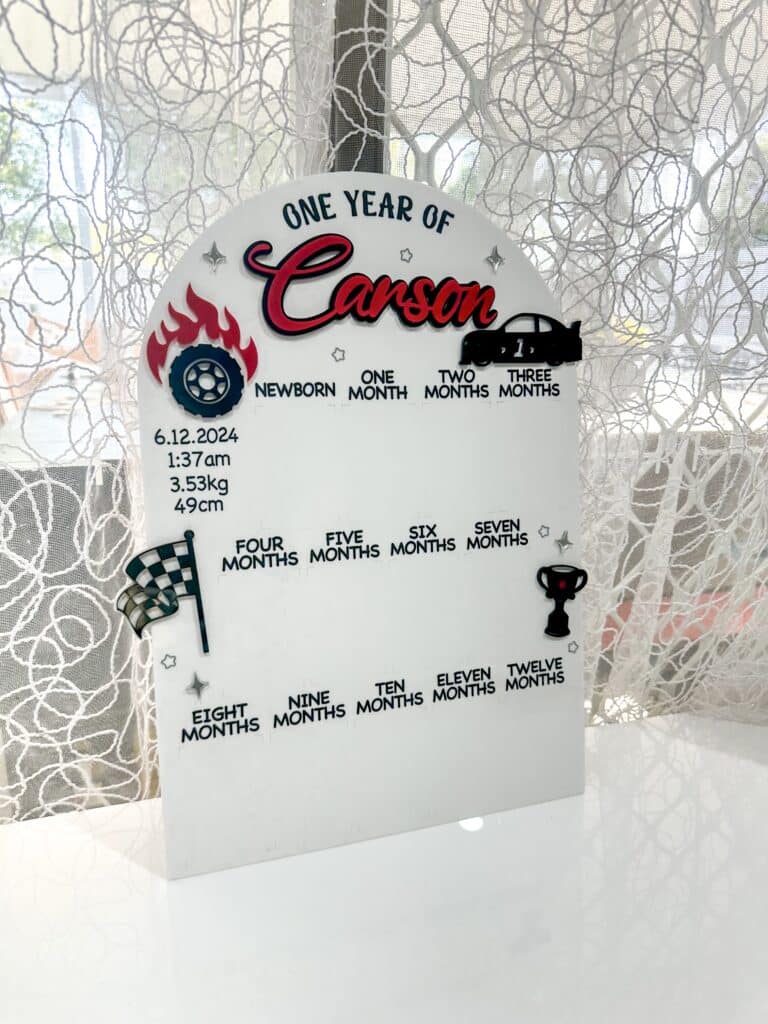 Custom car theme photo board, made of layered acrylic, ready for personalisation.