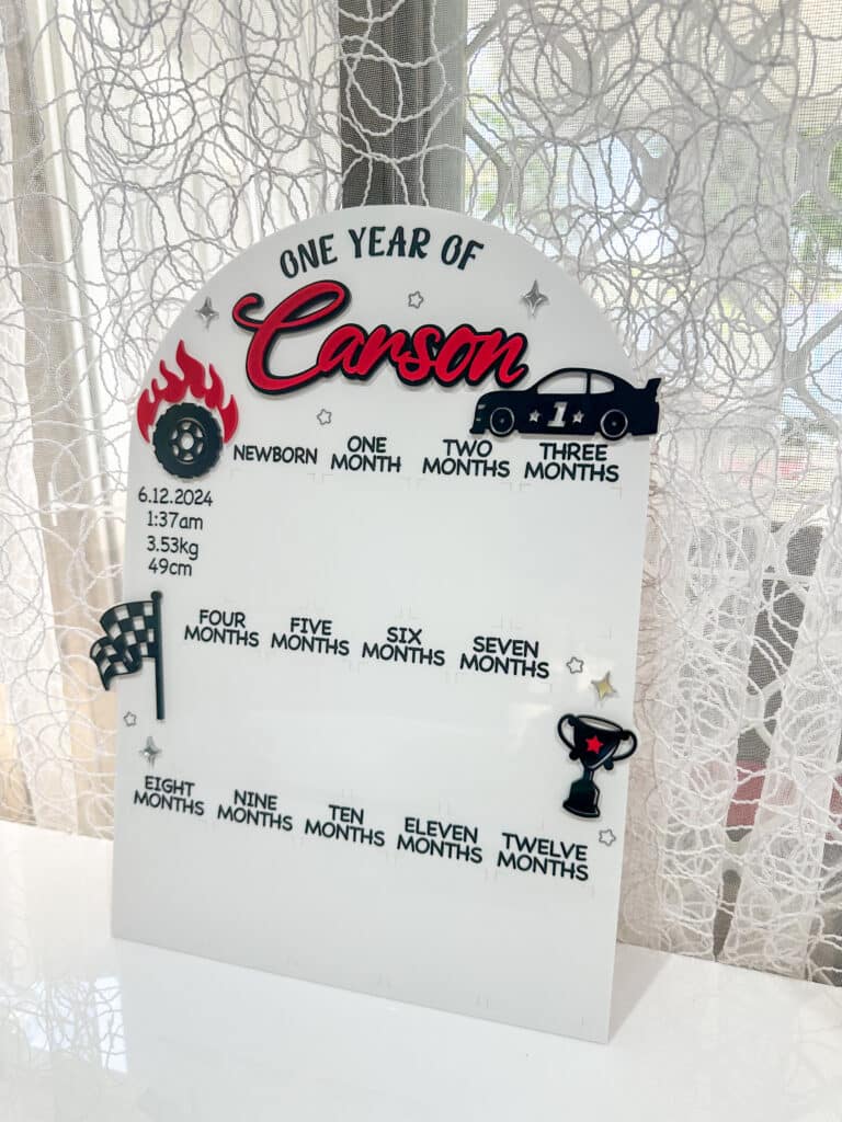 Customised car theme photo board made from layered acrylic, ready for personalisation.