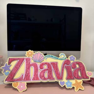 The product is a custom, handcrafted, and personalised bedroom name plaque made of layered acrylic, with a mermaid design.
