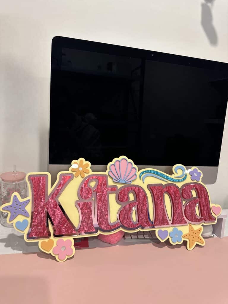 Acrylic mermaid room sign, customised with a personal touch, perfect for a child's bedroom.