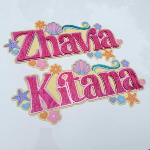Personalised acrylic name sign in clear acrylic with script lettering on a neutral background.