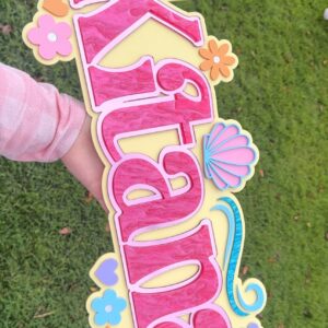 Custom theme triple layer name sign, personalised in script style, made of layered acrylic.