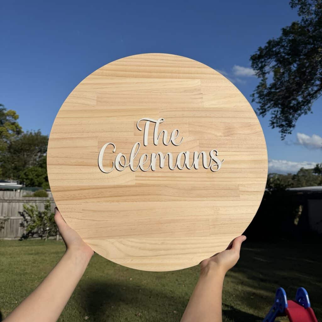 Personalised 3D guest book sign, laser-engraved for home or office display, with an engraved wood base and raised acrylic.