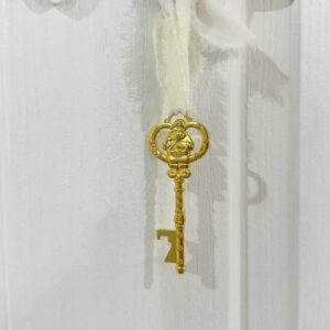 Personalised Christmas Bow Door Hanger – Santa’s Key, made from layered acrylic with a mirrored finish.
