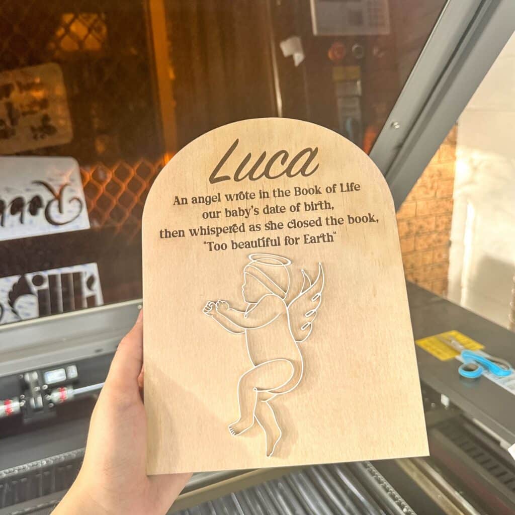engraved wood base with raised acrylic lettering, "Too Beautiful for Earth" plaque.