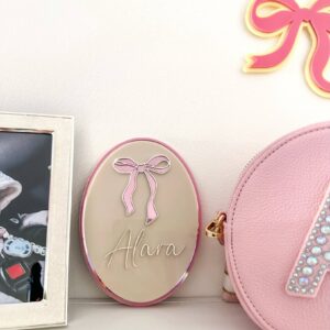 Personalised layered acrylic name sign with laser-engraved lettering, ready for personalisation.