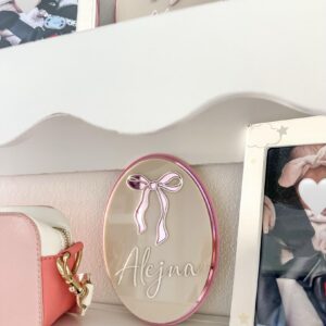 A custom, triple-layered acrylic name plaque featuring a hot air balloon design, ready for personalisation.