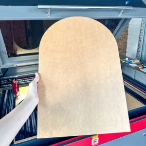 A custom, blank, A6 to A1 size, arch-shaped, acrylic plaque, ready for personalisation.