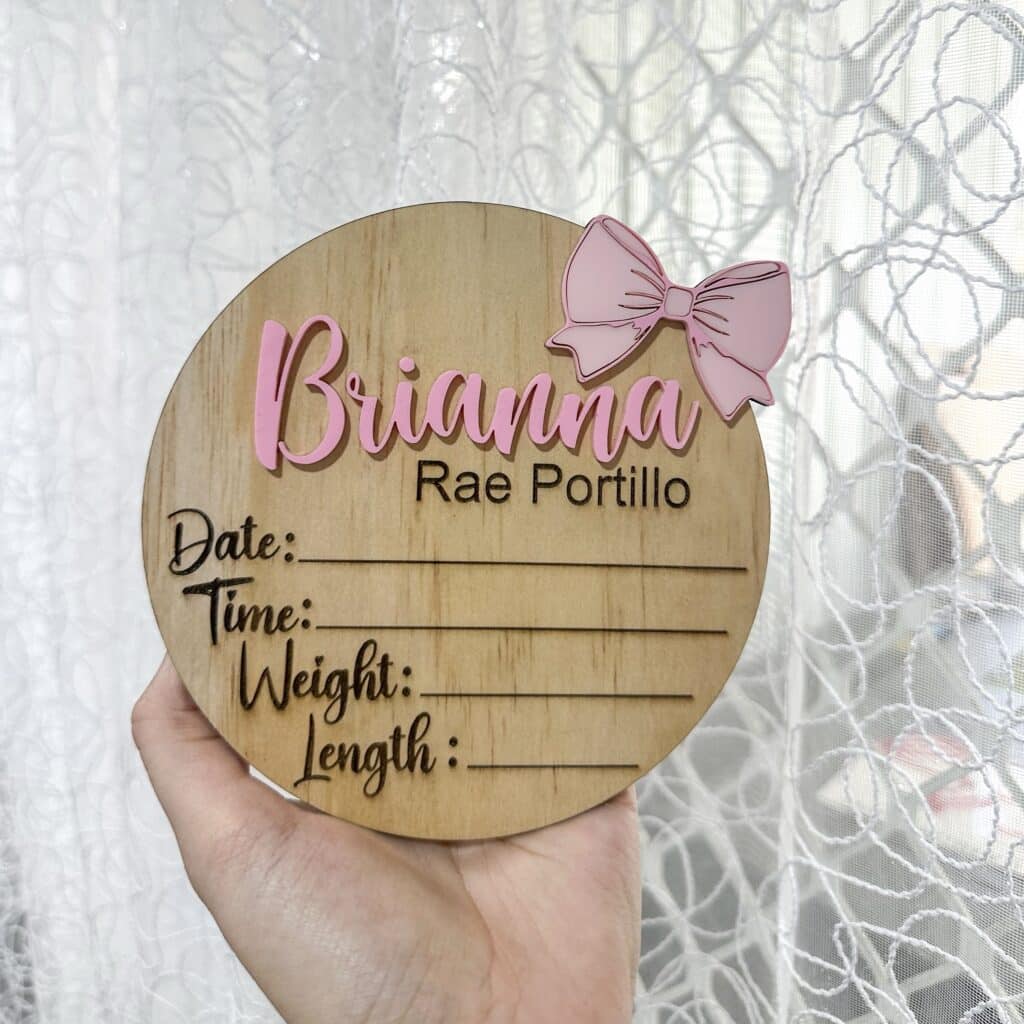 Baby Announcement Plaque with Details Bow Theme, made from layered acrylic, featuring a custom, handcrafted, and bespoke.