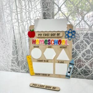 Vertical personalised acrylic name sign photographed on a neutral background.