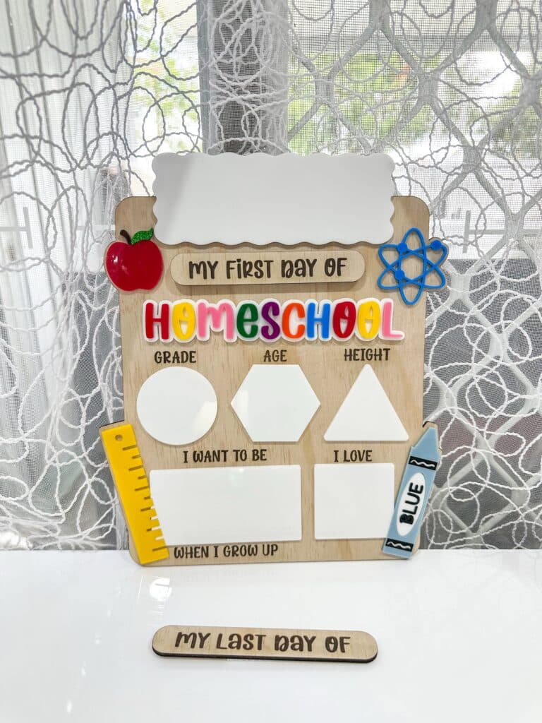 Vertical personalised acrylic name sign on clear acrylic panel.