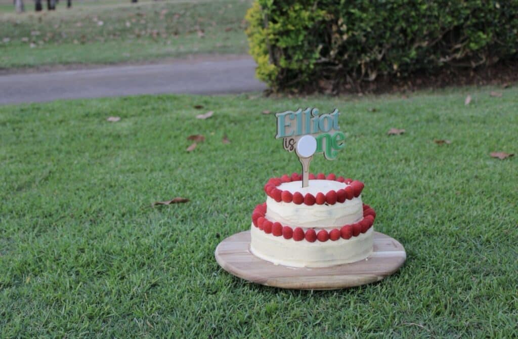 Golf Acrylic Cake Topper | Hole in One Birthday: A custom, handcrafted, 3D golf ball and hole in one design, made from clear.