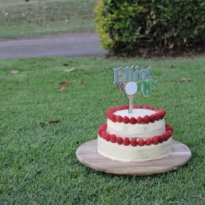 Golf Acrylic Cake Topper | Hole in One Birthday: A custom, handcrafted, 3D golf ball and hole in one design, made from clear.