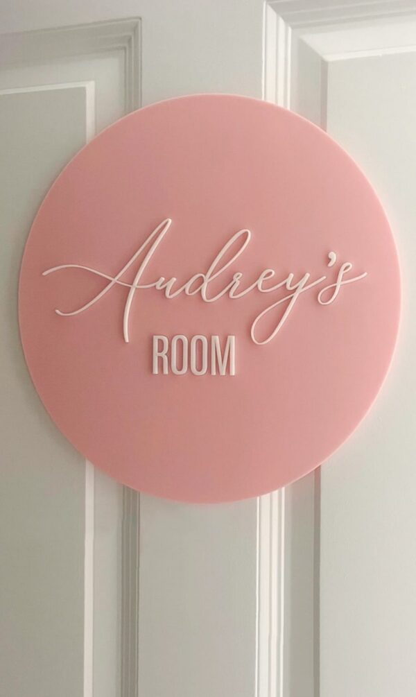 acrylic door sign for kids rooms and nursery, personalised with a custom name in a bold font.