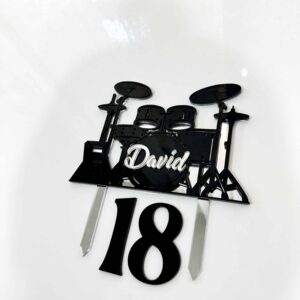 Personalised acrylic name sign with laser-engraved lettering on a neutral background.