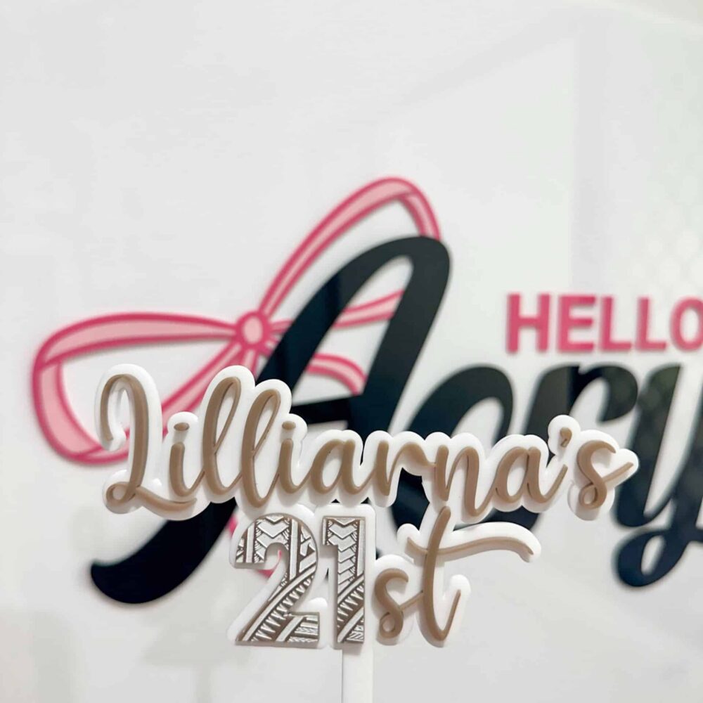 Personalised acrylic name sign showing custom lettering suitable for a nursery or desk.