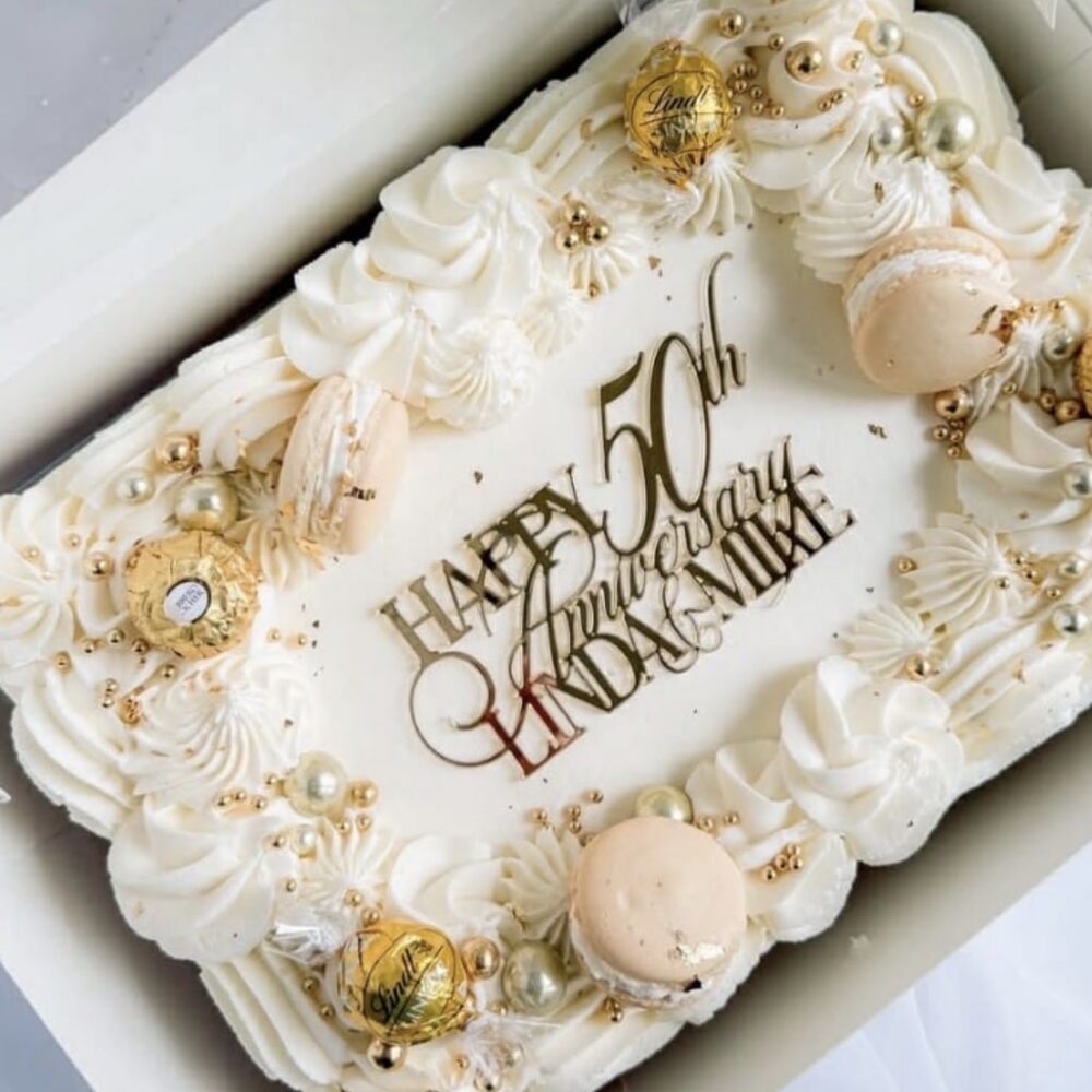 Personalised acrylic name wall sign with cut lettering for room or event display.