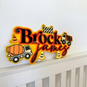 Personalised acrylic name plaque displayed on a flat surface.