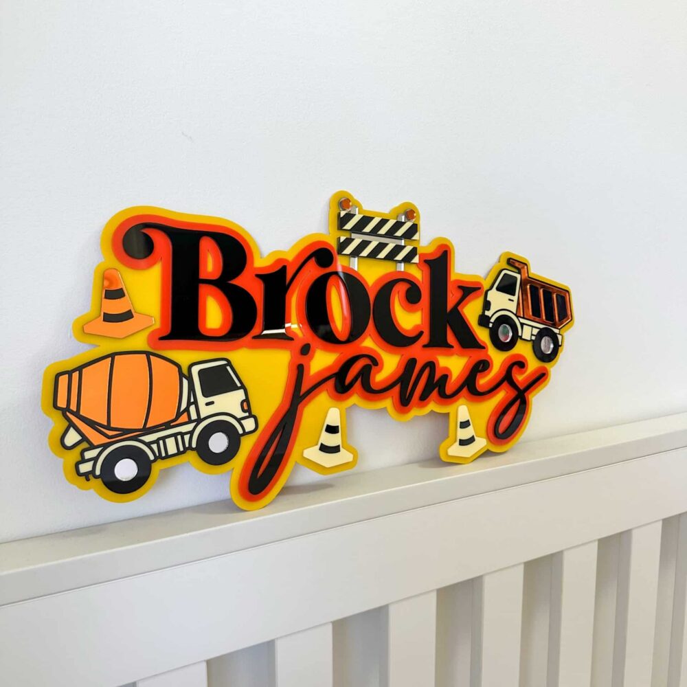 Personalised acrylic name plaque displayed on a flat surface.