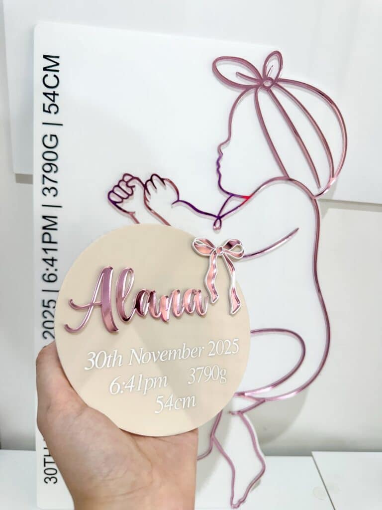 engraved plywood with acrylic detailing, with mirrored finish, baby girl birth announcement bow personalised plaque.