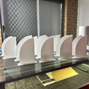 Personalised acrylic wall name sign photographed against a plain background.