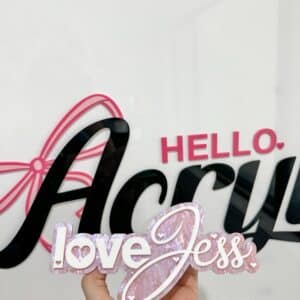 Personalised acrylic name plaque with laser-engraved lettering for gifts or home.