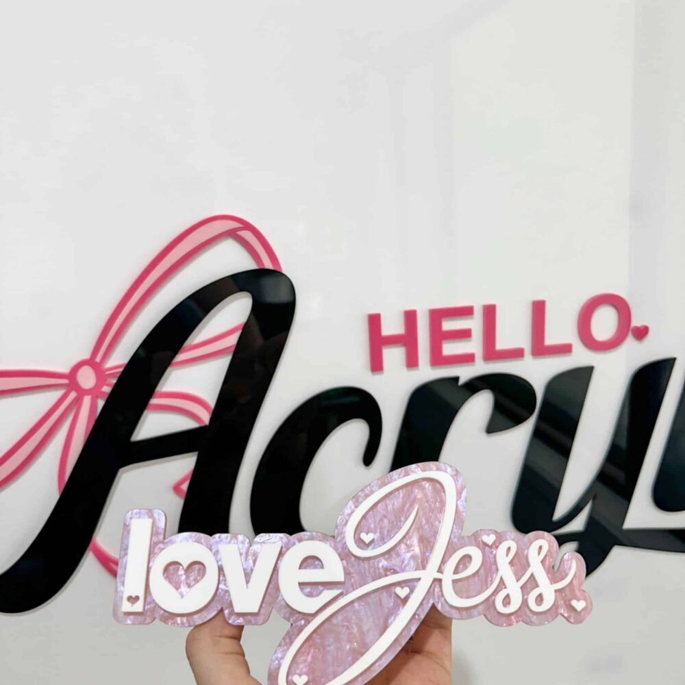 Personalised acrylic name plaque with laser-engraved lettering for gifts or home.