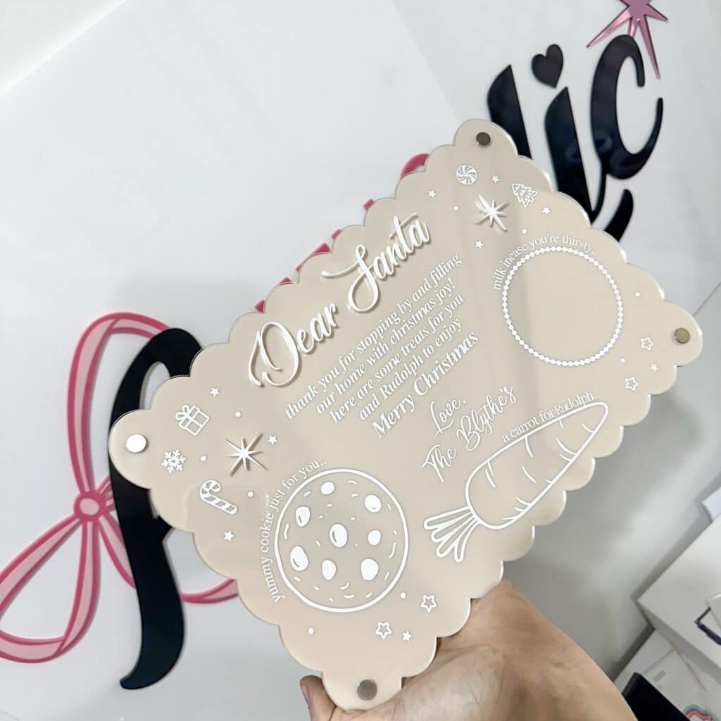 Personalised acrylic name sign in modern script, ideal for gifts and home decor.