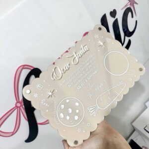 Personalised acrylic name sign in modern script, ideal for gifts and home decor.