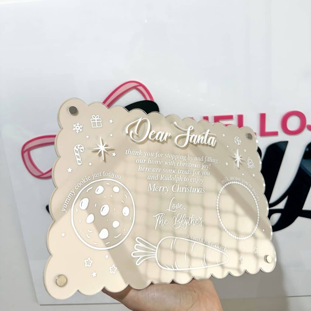 Laser-engraved personalised acrylic name plaque on a white background.