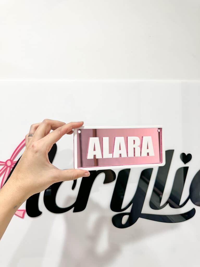 Acrylic layered name plate for kids' ride-on vehicles, ready for personalisation