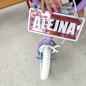 layered acrylic name plate with a mirrored finish, custom ride-on name plate for kids vehicles.